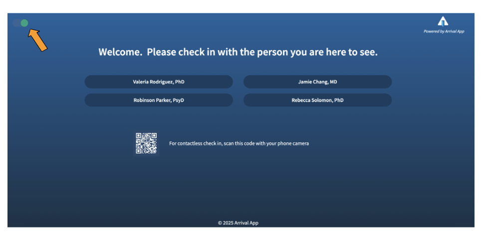 Picture of a screen with a message saying "Welcome. Please check in with the person you are here to see." It lists four names of people, and also has a QR code next to the instructions, For contactless check in, scan this code with your phone camera.
In the upper left hand corer of the screen there is a green dot, with an orange arrow pointing to it. In the upper right hand corner is the Arrival App logo which is a picture of an open door, and the words "Powered by Arrival App".